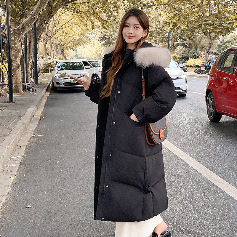 A long knee-length cotton-padded jacket