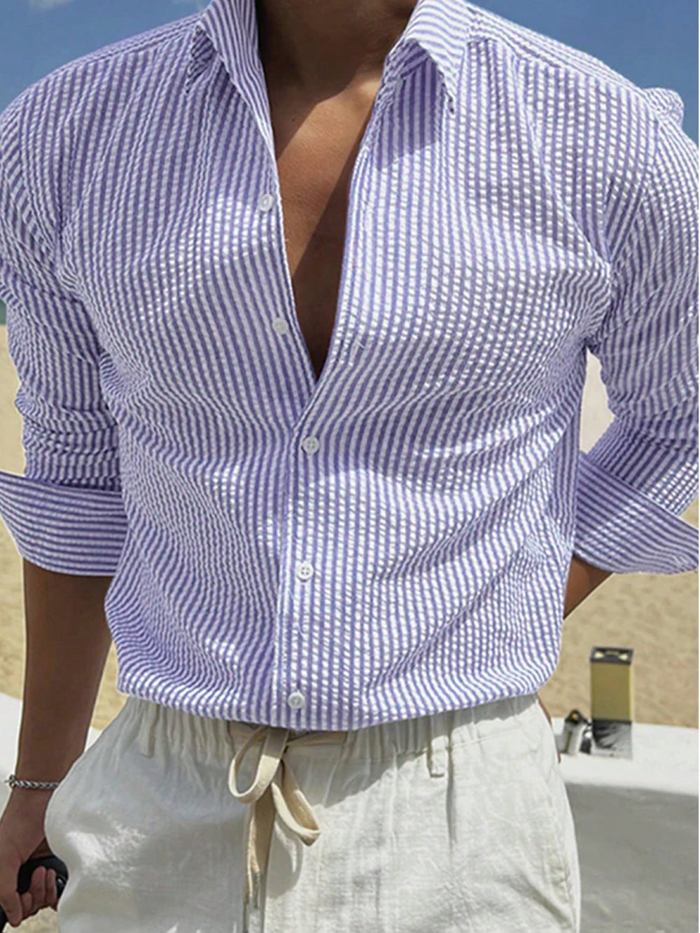 Striped cardigan with a turned-up collar and long sleeves