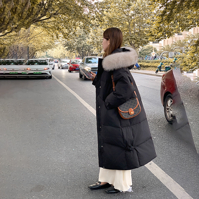 A long knee-length cotton-padded jacket