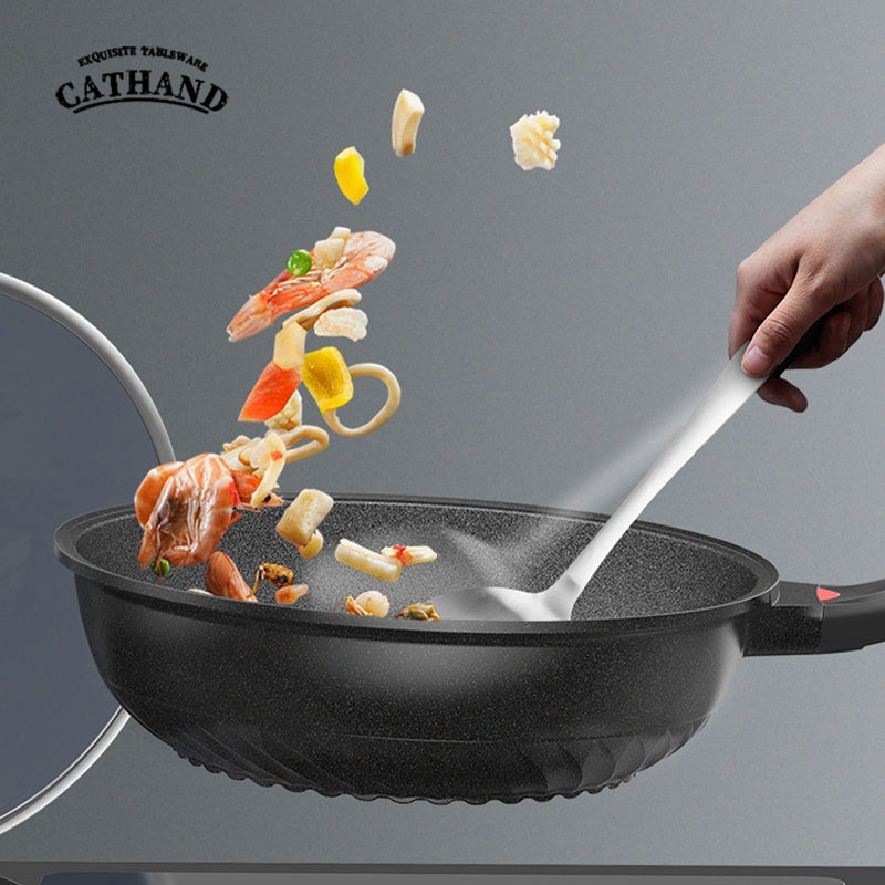 A flat-bottomed non-stick wok made of tourmaline